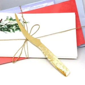 Ouvre lettre or gravé de fleurs