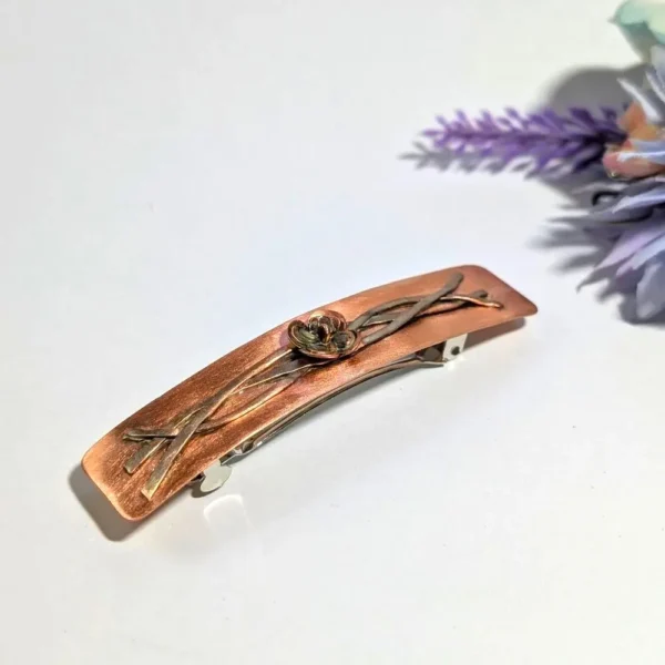 barrette avec une fleur en cuivre