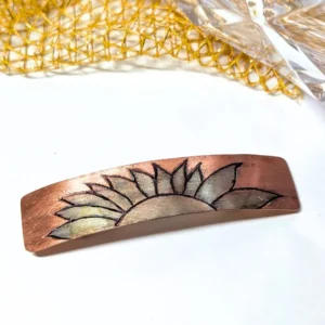 barrette en cuivre et soleil argent gravé